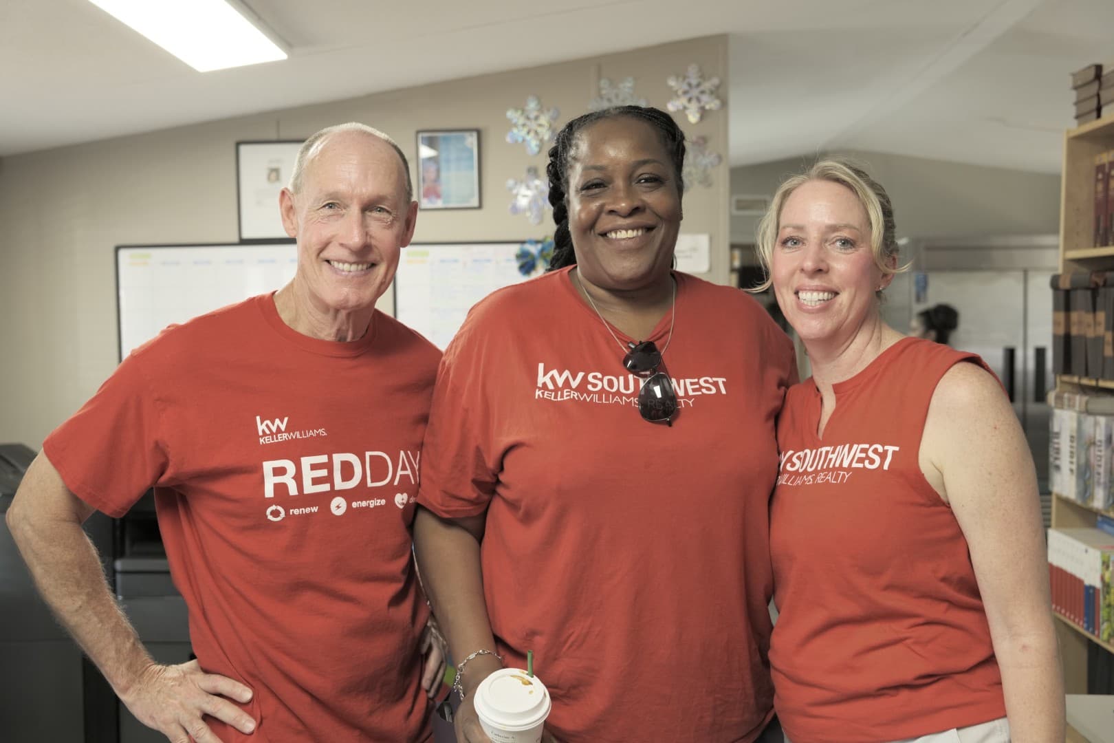 KW Southwest agents in red shirts on RED Day 2026