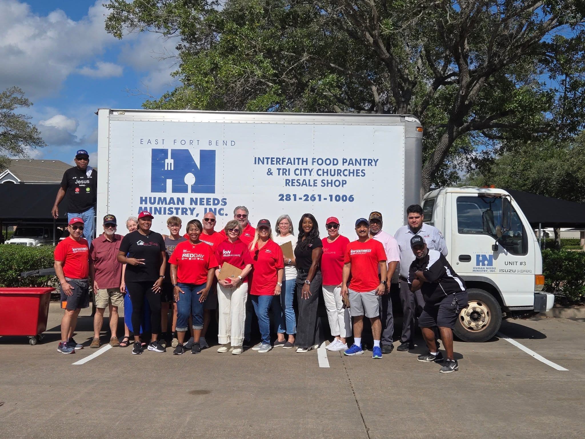 KW Southwest agents and volunteers in front of the East Fort Bend Human Needs Ministry truck at Shredding Hunger 2025